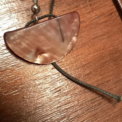 Earrings like new made of natural shell material