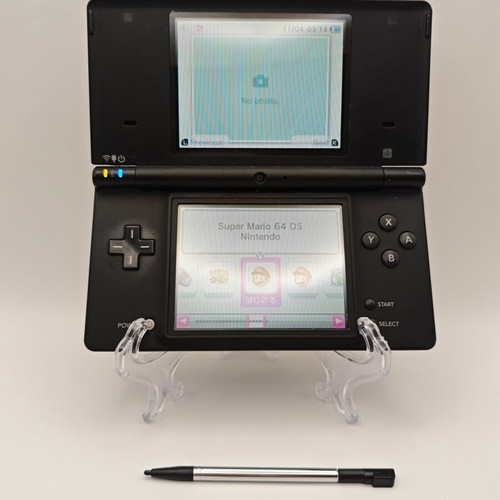Nintendo Dsi console with 100+ DS and Gameboy games, new stylus and USB cable