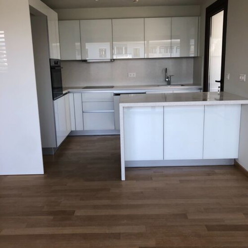 White lacquer kitchen with glass and countertop new