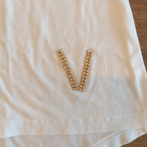White blouse with open back and polka dot details Vergi one size like new