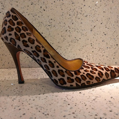 DoDiCi Gold animal print pumps like new, pony-skin leather