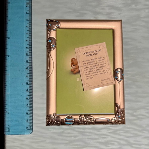 Photo album like new for newborns with silver-plated frame