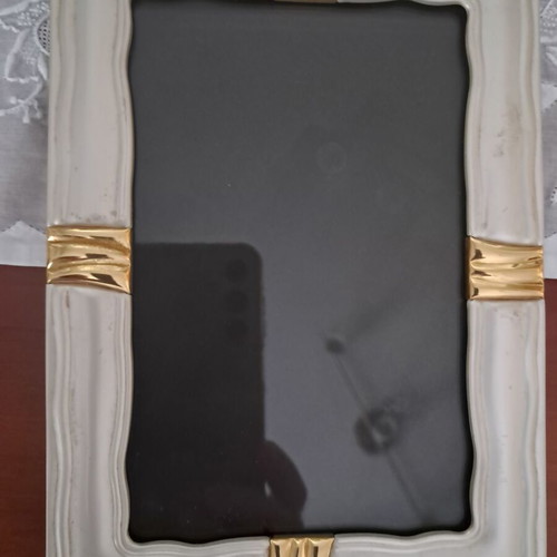 Silver photo frame used, 18x12 cm with gold design and velvet back