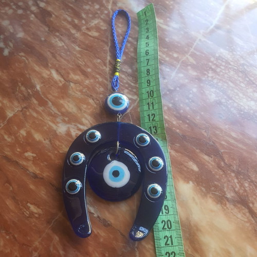 Gouri horseshoe with evil eye charm