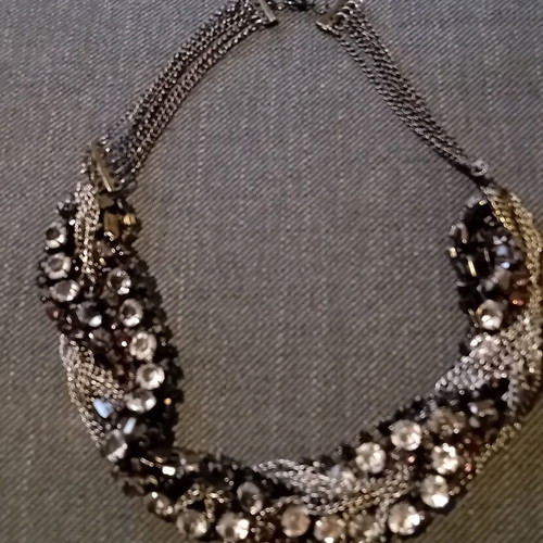 Fashion jewelry necklace in silver tones like new