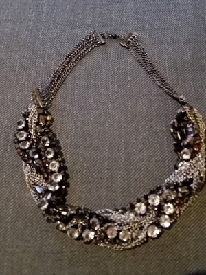 Fashion jewelry necklace in silver tones like new