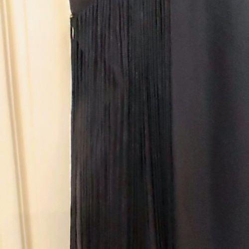 Black blouse with fringes used and black evening dress