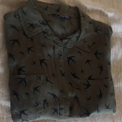 Shirt with swallows in khaki color like new