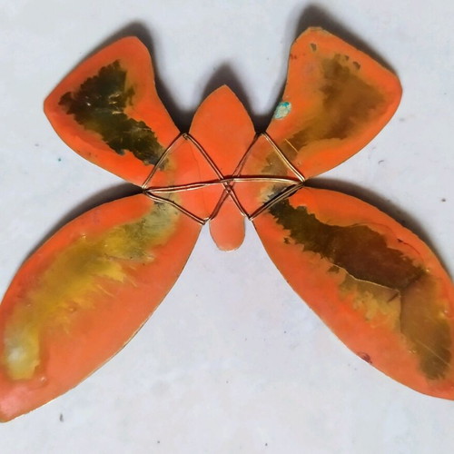 Metal handmade butterfly and metal pomegranate box used
