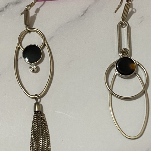 Long earrings used, black and silver color