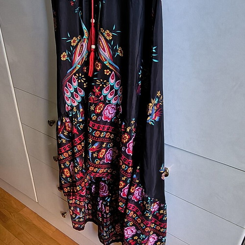 Asymmetric boho maxi dress with peacock and floral pattern, black