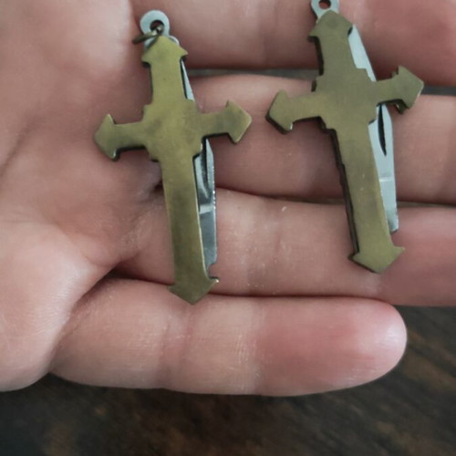 Copper cross keychains with sharp knives, like new, set of 2