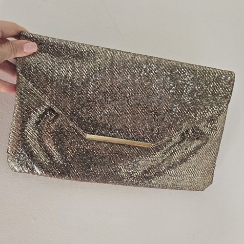 Clutch bag with subtle gold shimmer, like new