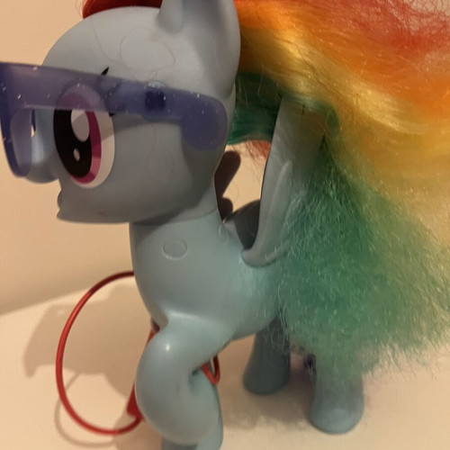 My Little Pony Singing Rainbow Dash figure used with microphone and music