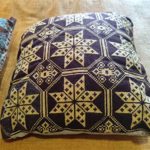 Decorative pillows handmade set like new, embroidered cross-stitch