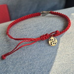 Adjustable red bracelet like new