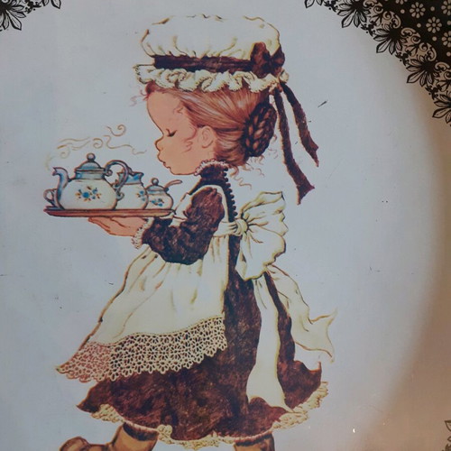 Sarah Kay decorative metal tray and porcelain plate used, set of 2 pieces