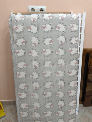 Cot with mattress like new, removable side rails