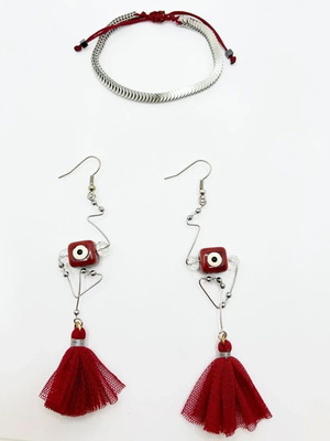 Handmade earrings with ceramic eye element and tassel, like new