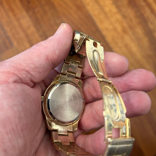 U.S. Polo Assn. women's watch used, gold with black bezel