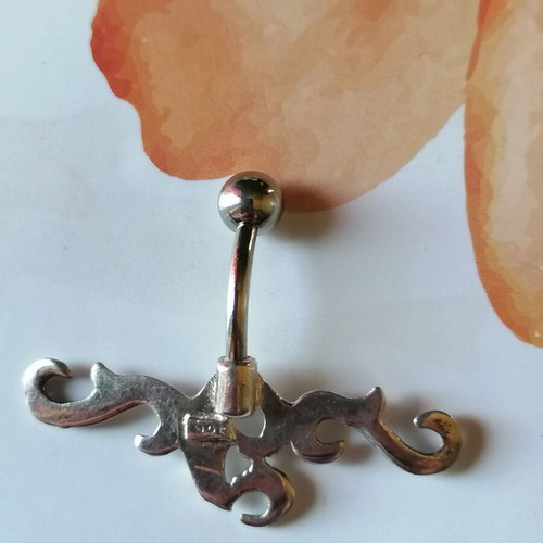 Tribal navel piercing with surgical steel bar and 925 silver decoration