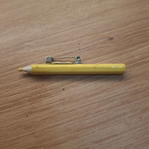 Yellow pin brooch