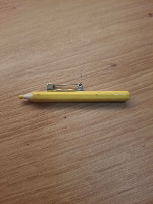 Yellow pin brooch