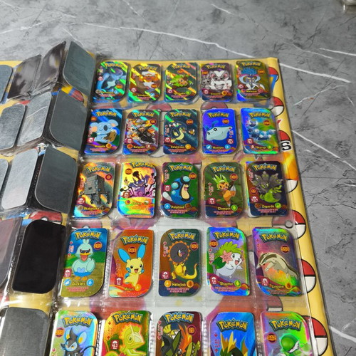 Pokemon collectible metal tags used