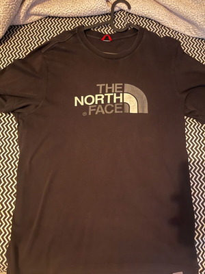 The North Face T-shirt like new, sizes S and M, black and white