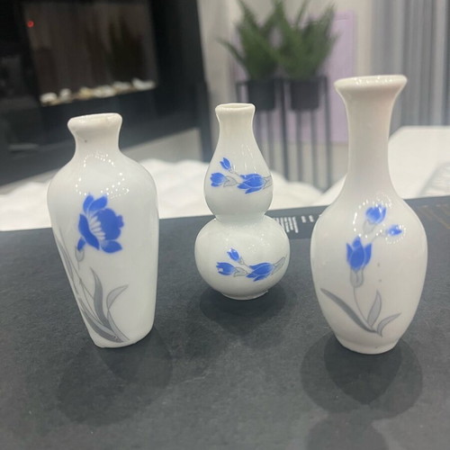 Miniature ceramic set of three vases like new