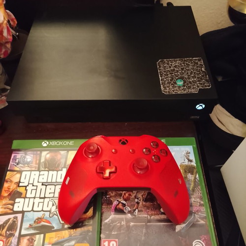 Xbox One console like new with 1TB storage and extra black controller