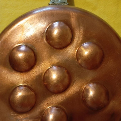 Vintage copper egg pan with 7 slots used