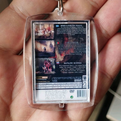 God of War 2 PS2 keychain new, acrylic