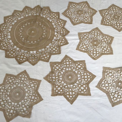 Set of 9 handmade antique doilies used