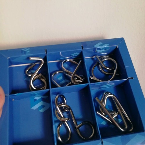 Metal Puzzle Game like new, set of 5 (one missing)