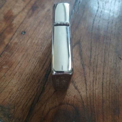 Zippo lighter used with embossed eagle emblem