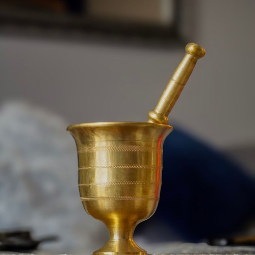 Authentic vintage mortar with pestle made of brass like new