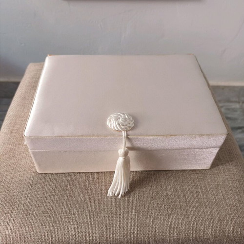 Jewelry box used, salmon color with tassel
