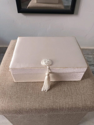 Jewelry box used, salmon color with tassel