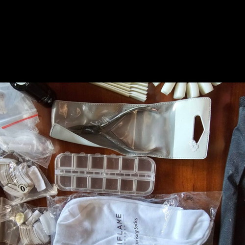 Nail art equipment used with tips, top coat, quickgel, and tools