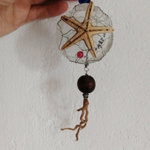 Art micro sculpture used with glass, wood, beads, starfish