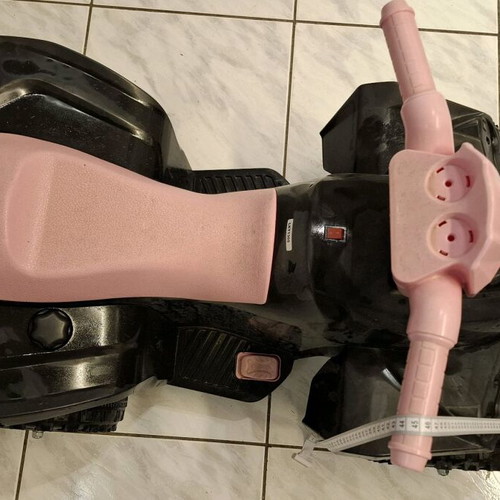 Children's electric ATV like new, black with pink details