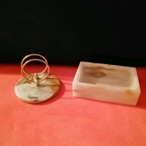Envelope stand and alavastrine pouch.