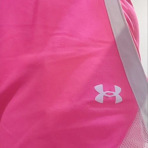 Under Armour pink shorts like new, size XS