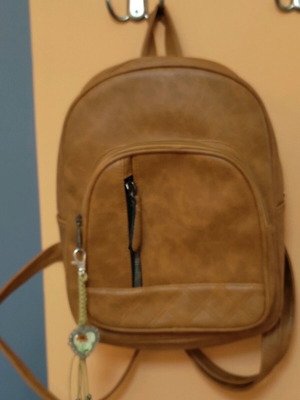Women's brown bag like new with decorative charm