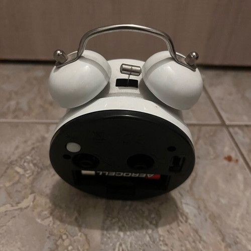 Table clock used, white with crack