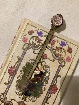 Vintage metal bookmark with wax melts used