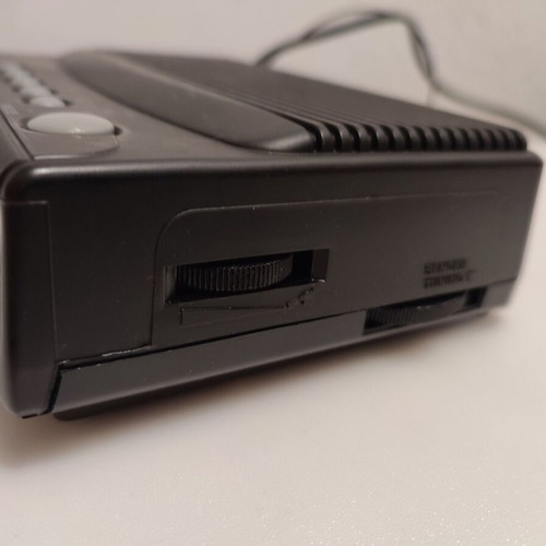Radio alarm clock used, fully functional with some scratches