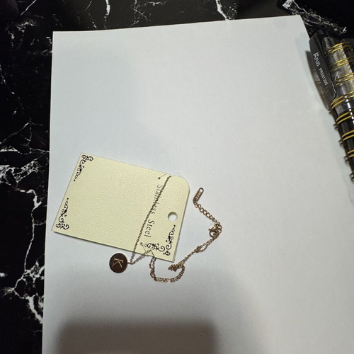 Necklace with initial K, gold color