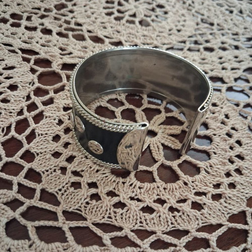 Metal bracelet with studs like new, leather and metal